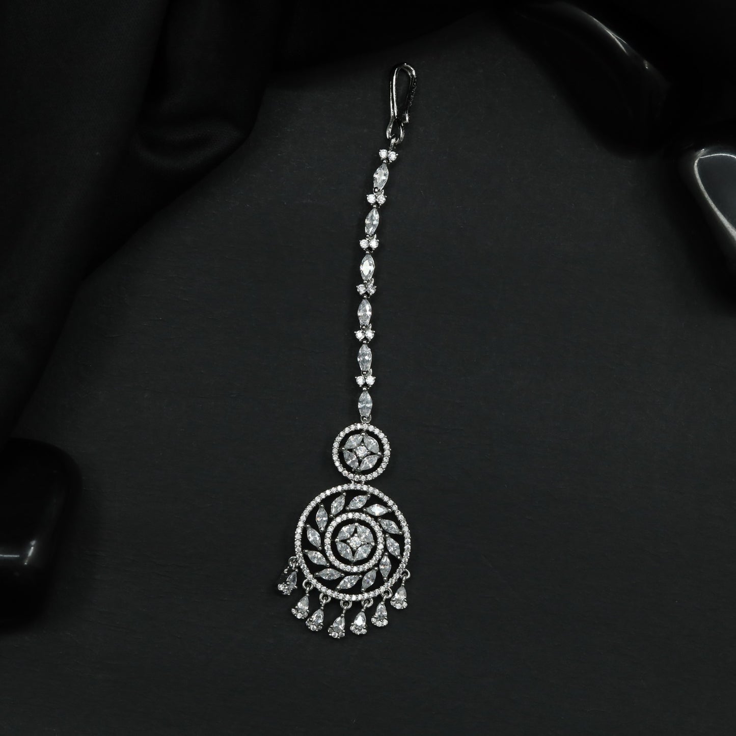Radiant Rhodium Tikka with Circular Openwork Pendant and Cascading Drops