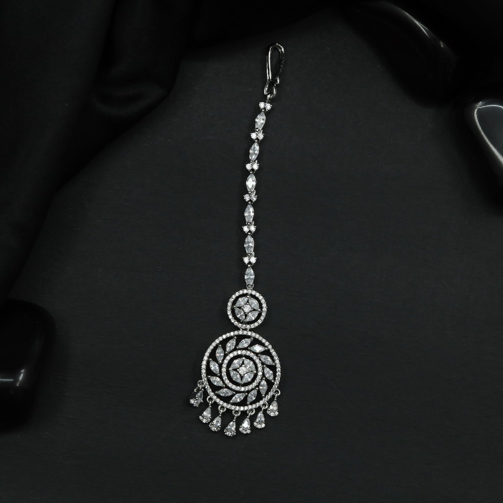 Radiant Rhodium Tikka with Circular Openwork Pendant and Cascading Drops