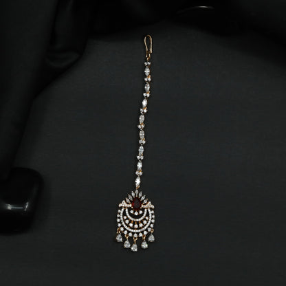 Tikka Featuring Decorative Crescent Pattern and Fringe Elements