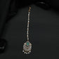 Tikka Featuring Decorative Crescent Pattern and Fringe Elements