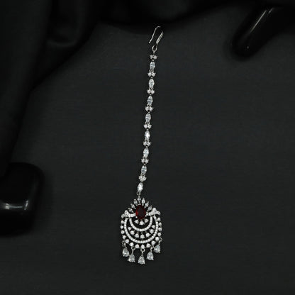 Tikka Featuring Decorative Crescent Pattern and Fringe Elements