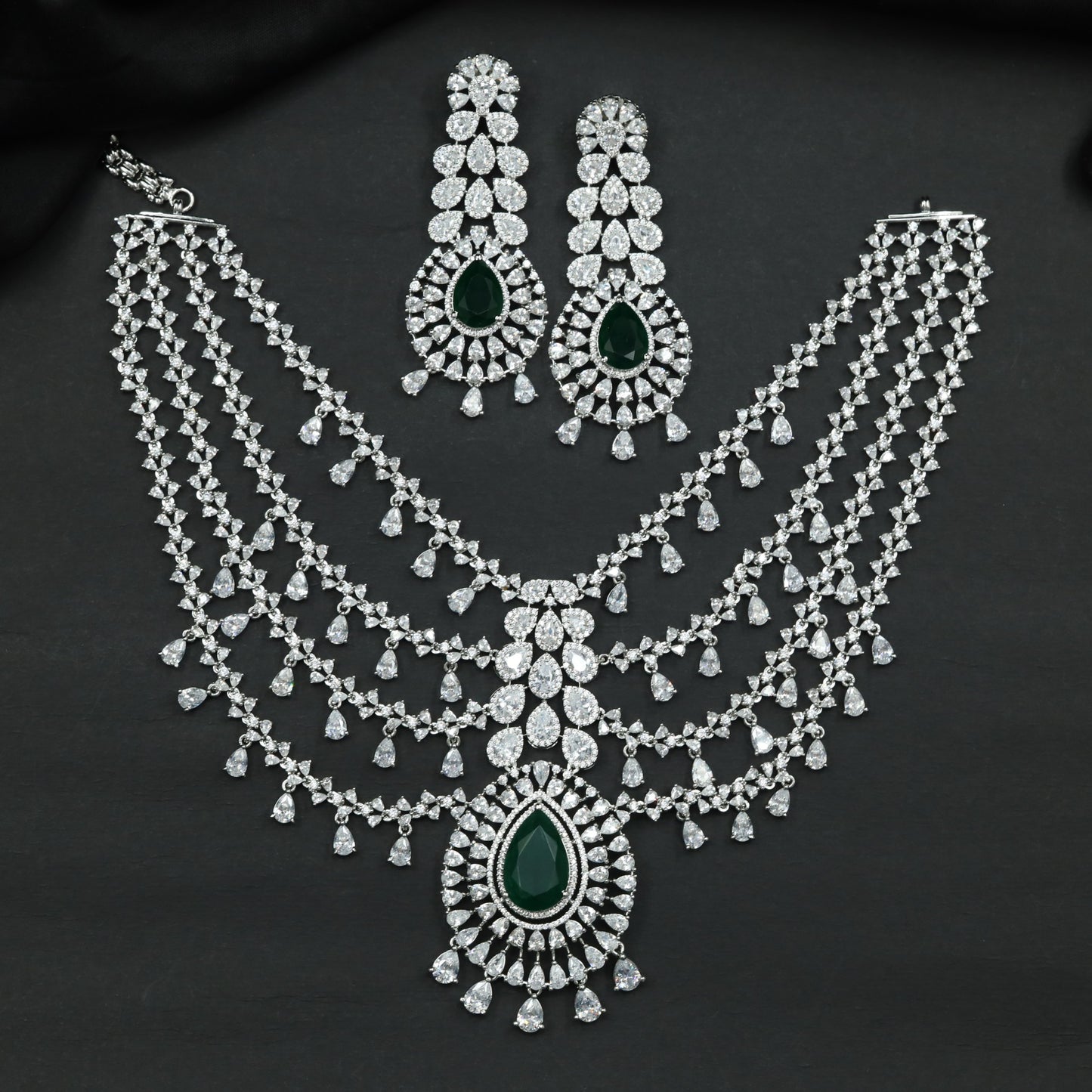 Rhodium Necklace with Layered Drape Pattern and Pendant Accent