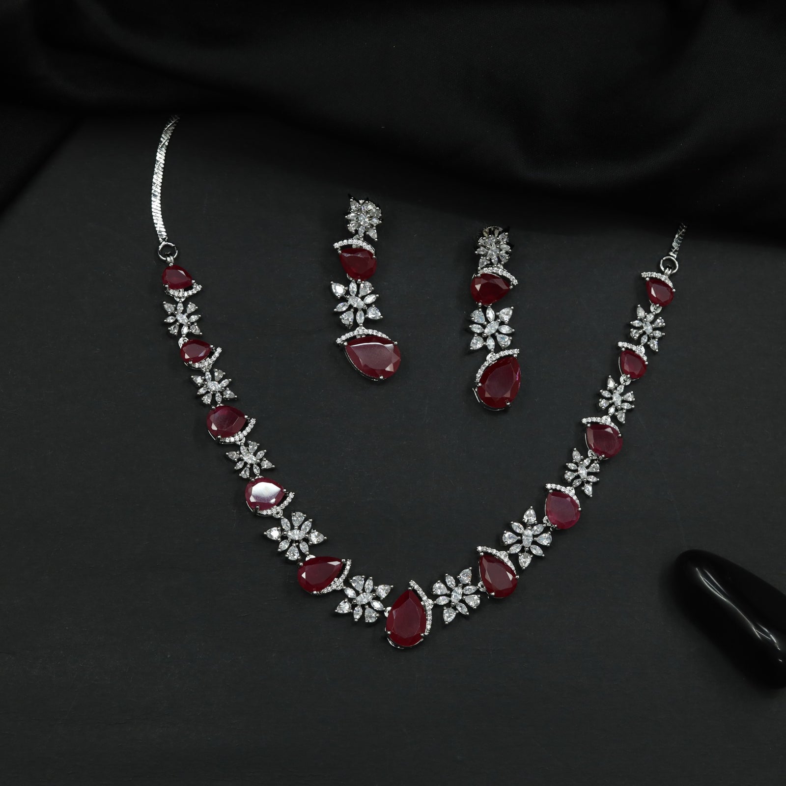 Necklace Featuring Alternating Floral Clusters and Pear Elements