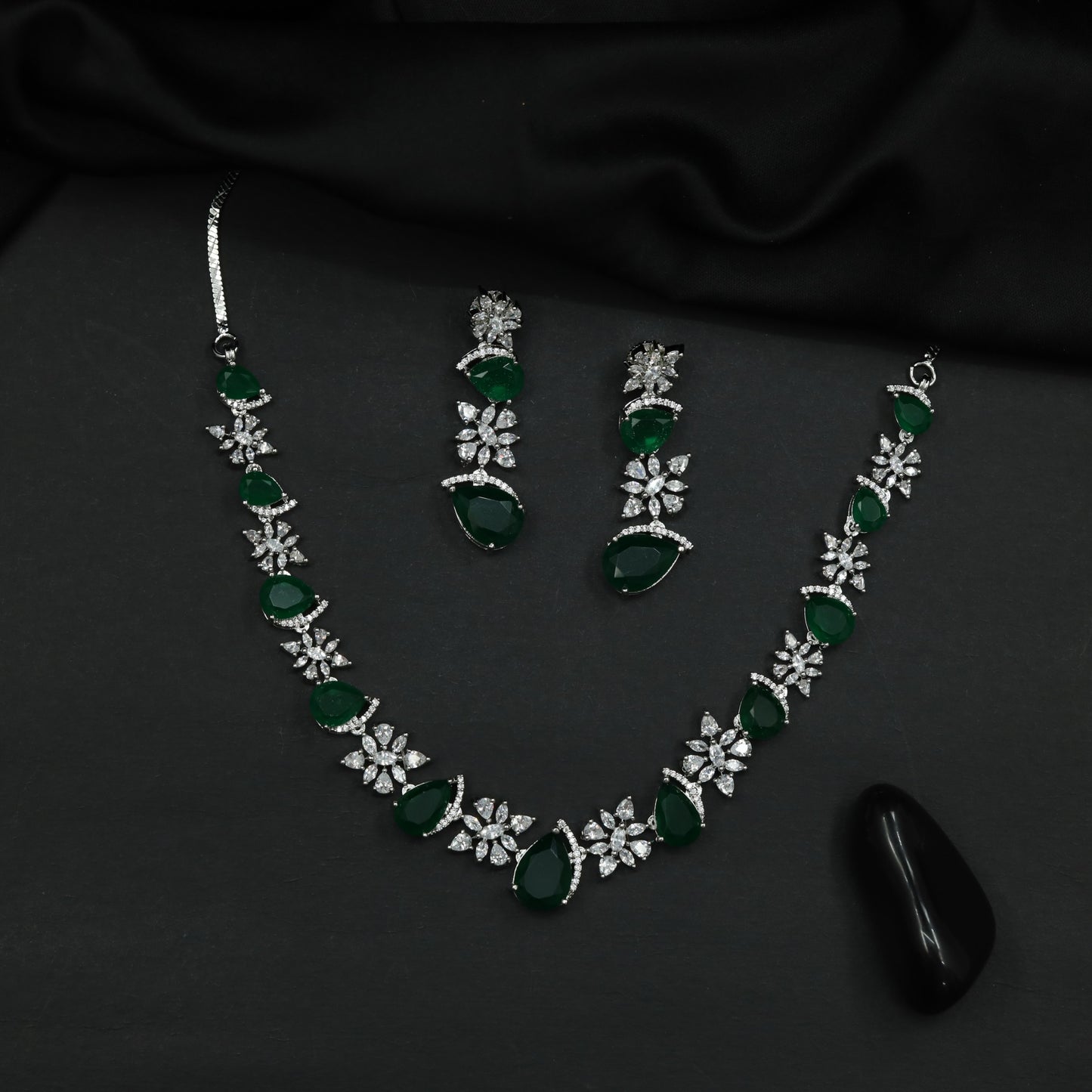 Necklace Featuring Alternating Floral Clusters and Pear Elements