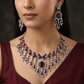 Rhodium Necklace with Leaf Clusters and Decorative Drop Arrangement