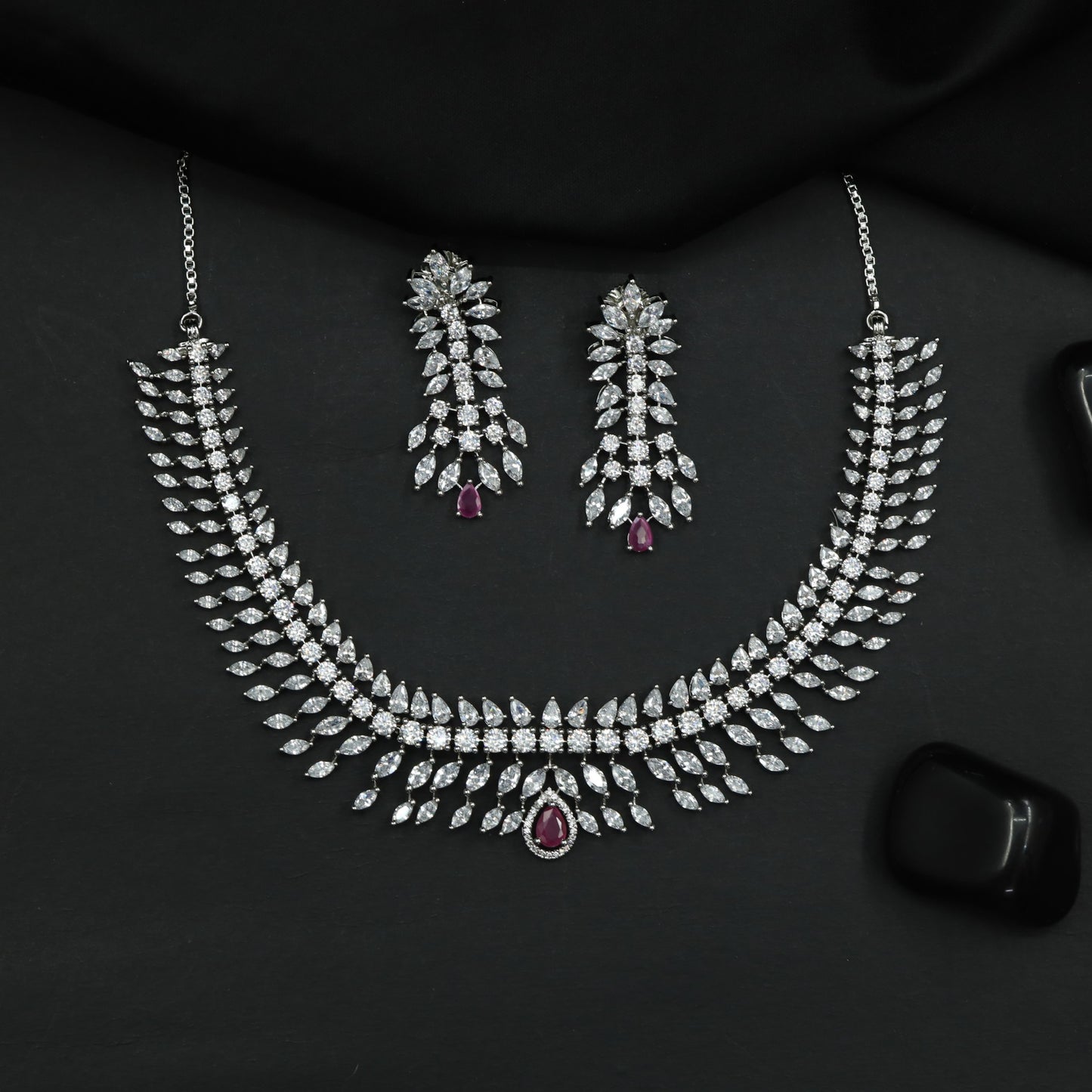 Designer Rhodium Necklace Featuring Cascading Leaf Elements