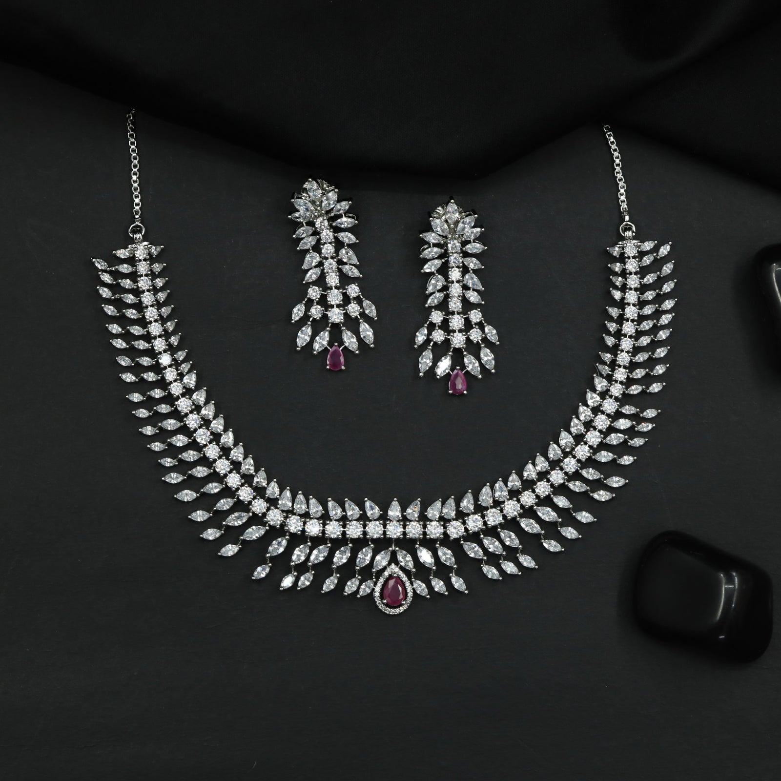 Designer Rhodium Necklace Featuring Cascading Leaf Elements