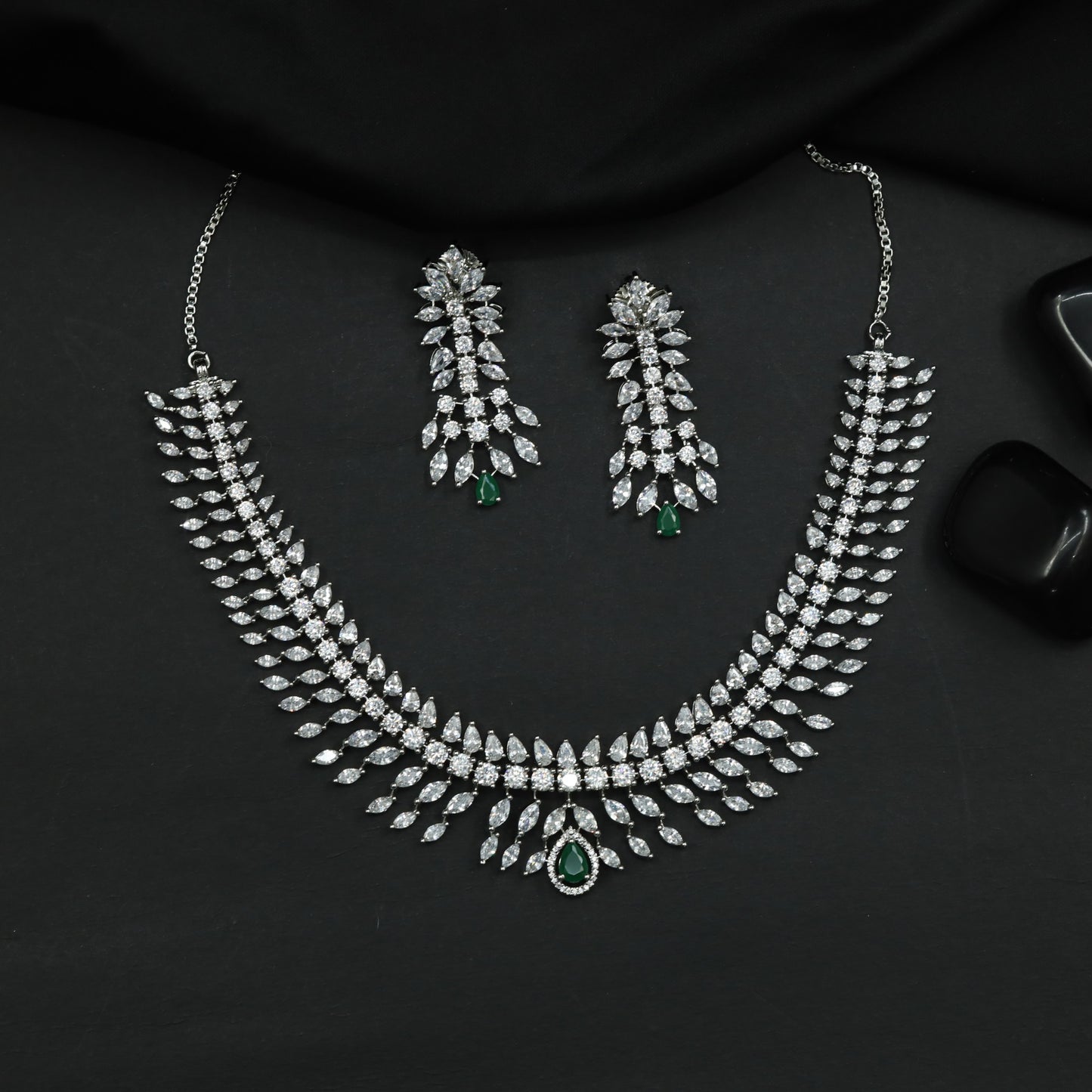 Designer Rhodium Necklace Featuring Cascading Leaf Elements