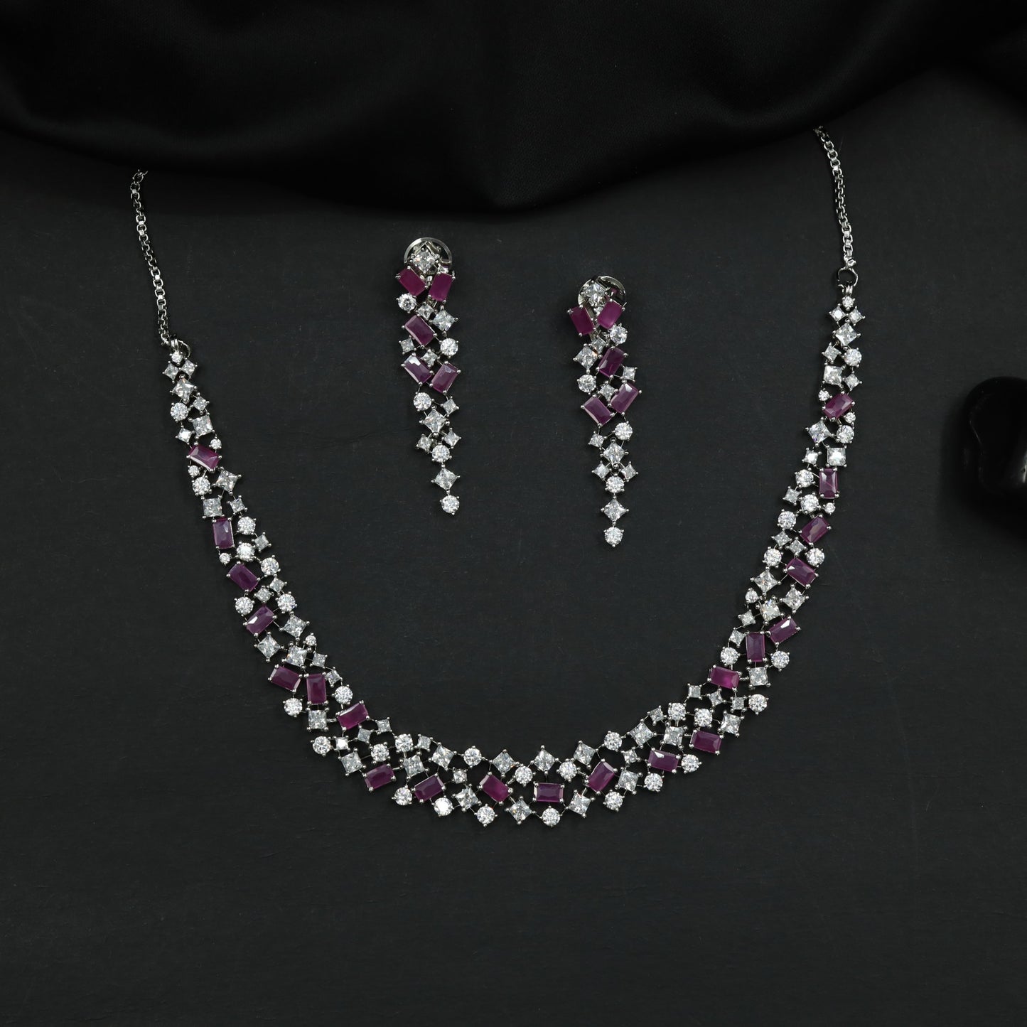 Rhodium Necklace Featuring Graduated Geometric Elements