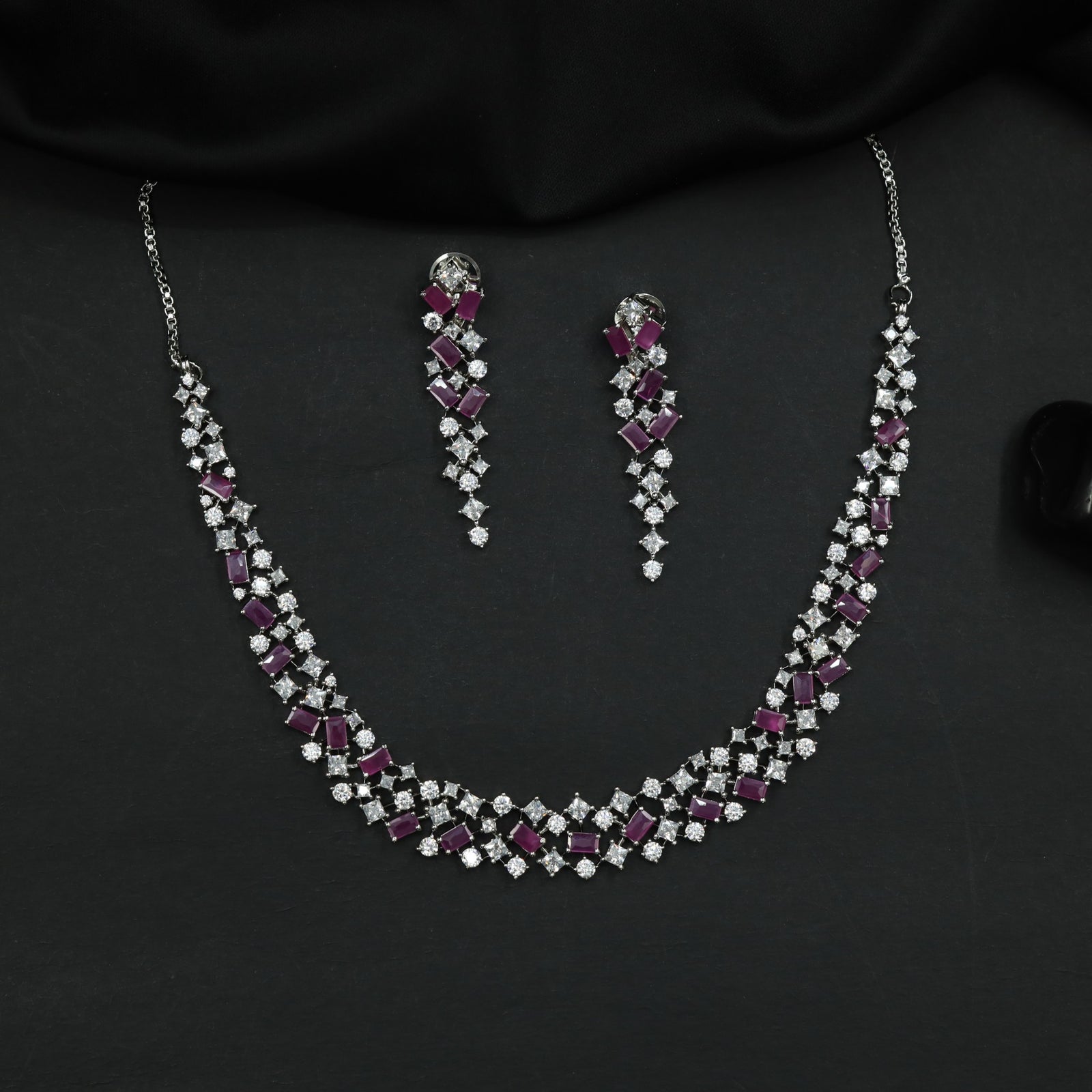 Rhodium Necklace Featuring Graduated Geometric Elements