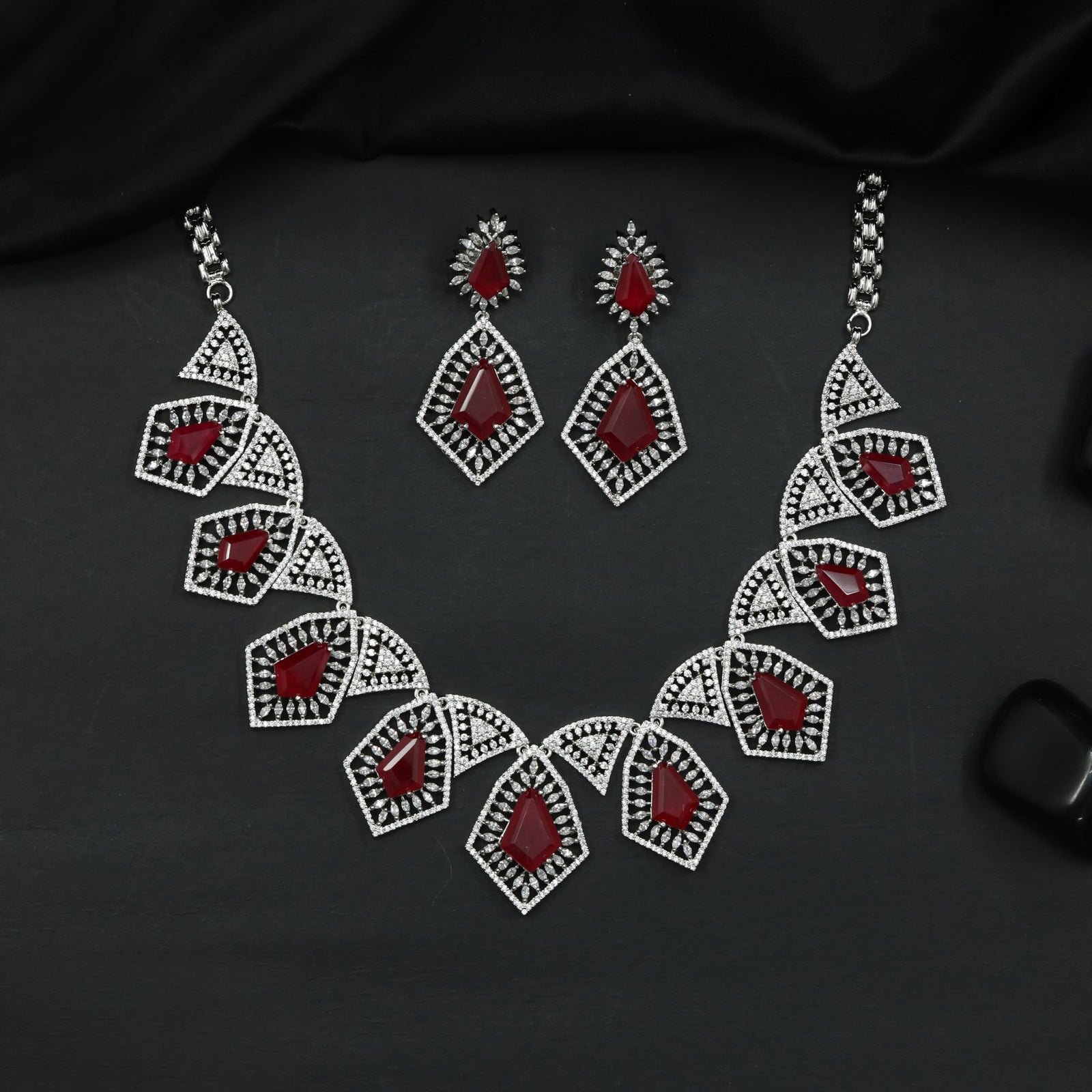 Geometric Gj Necklace with Repeating Pendant Links and Framed Drop Details
