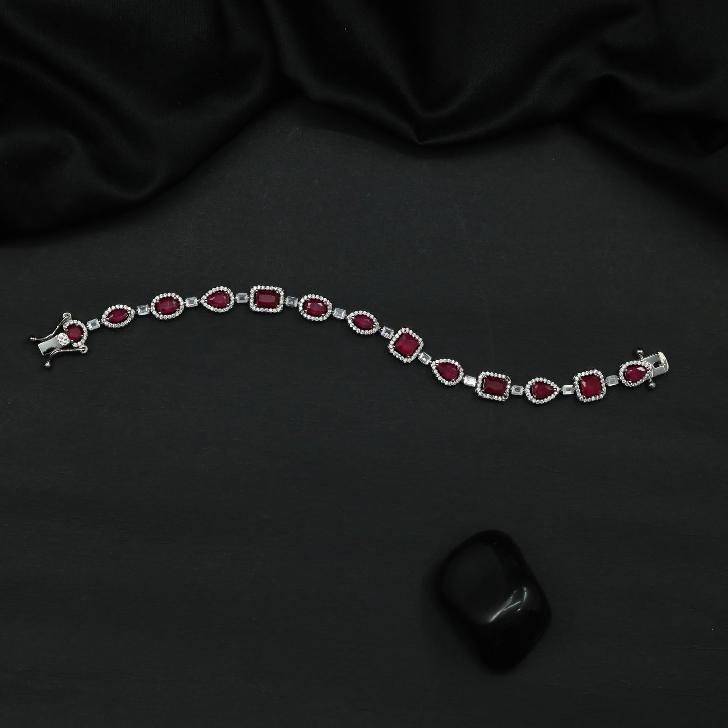 Rhodium Bracelet with Framed Cushion Links and Leaf Details