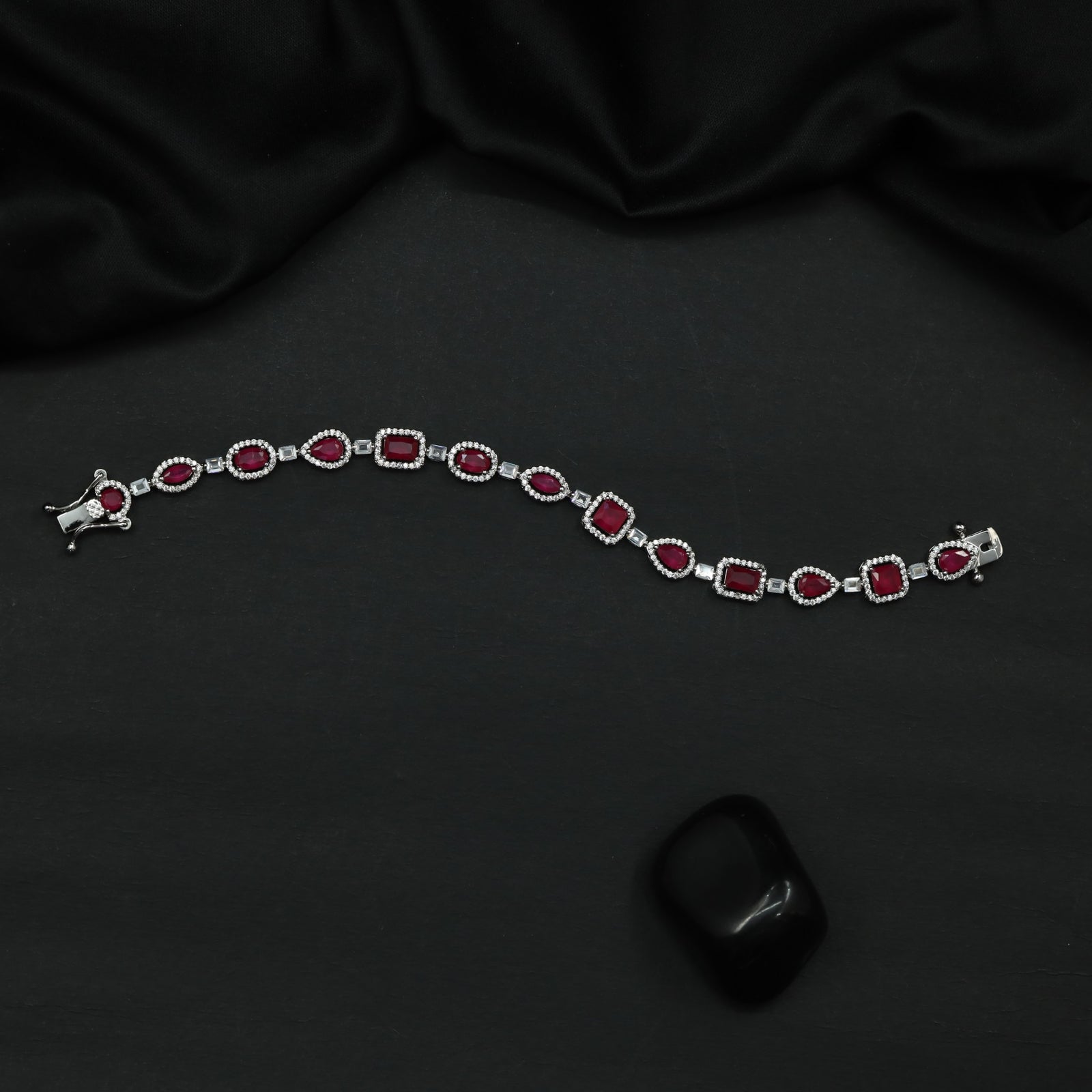 Rhodium Bracelet with Framed Cushion Links and Leaf Details