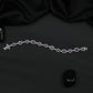 Rhodium Bracelet with Framed Cushion Links and Leaf Details