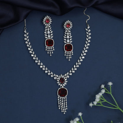 Contemporary Rhodium Necklace with Sunburst Drop Pendant
