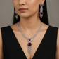 Contemporary Rhodium Necklace with Sunburst Drop Pendant