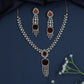 Contemporary Rhodium Necklace with Sunburst Drop Pendant