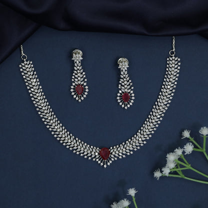 Statement Necklace with Layered Row Construction and Center Drop