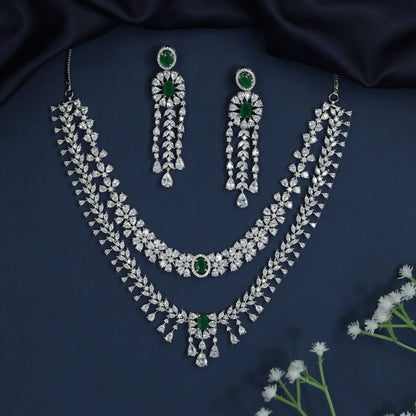 Rhodium necklace with draped collar styling and statement drop centerpiece