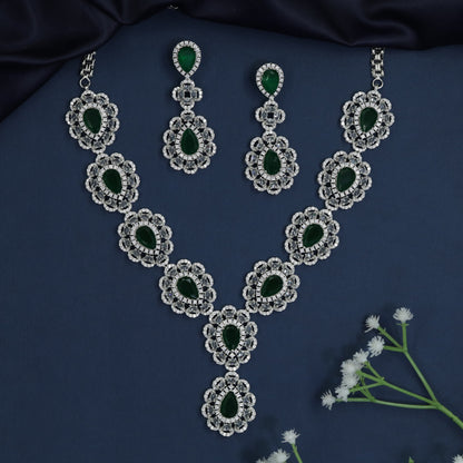 Rhodium necklace with scalloped halo stations and Y-drop silhouette