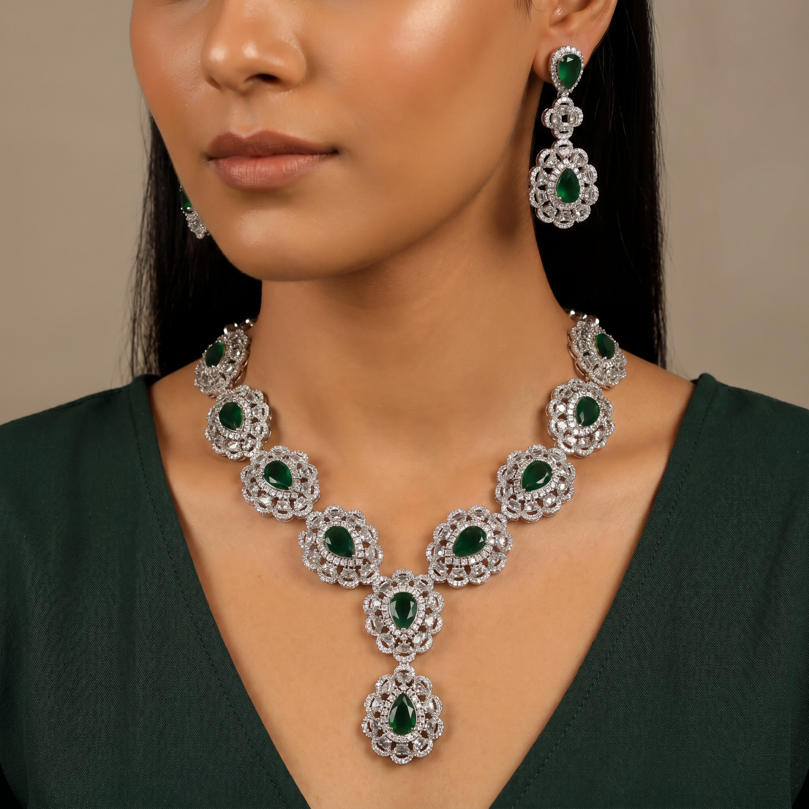 Rhodium necklace with scalloped halo stations and Y-drop silhouette