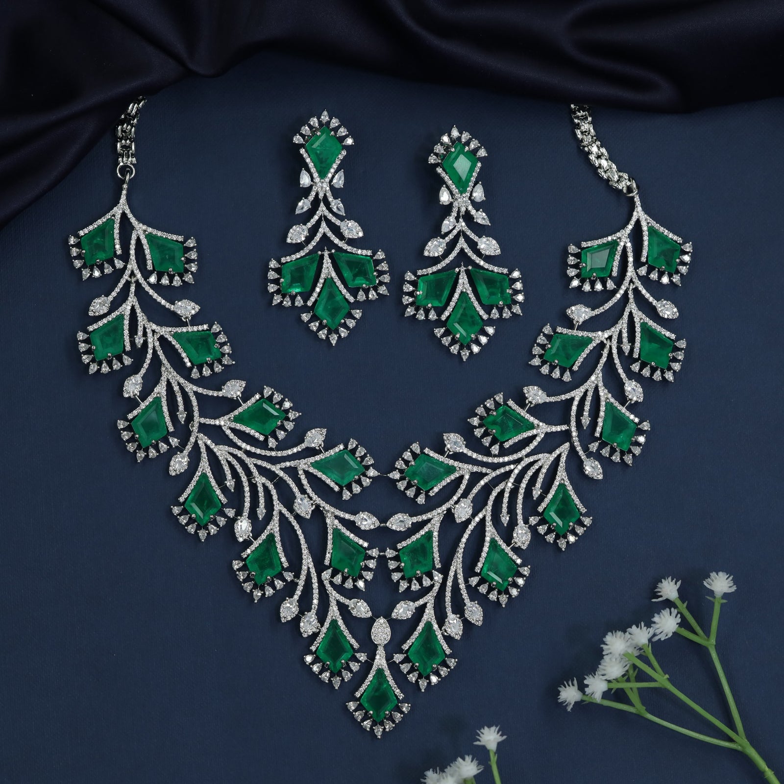 Leaf link rhodium necklace with cascading branch design