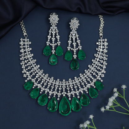 Teardrop frame rhodium necklace with scalloped neckline design