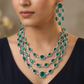 Grand occasion rhodium necklace with draped medallion arrangement