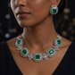 Rhodium necklace with articulated medallion link construction