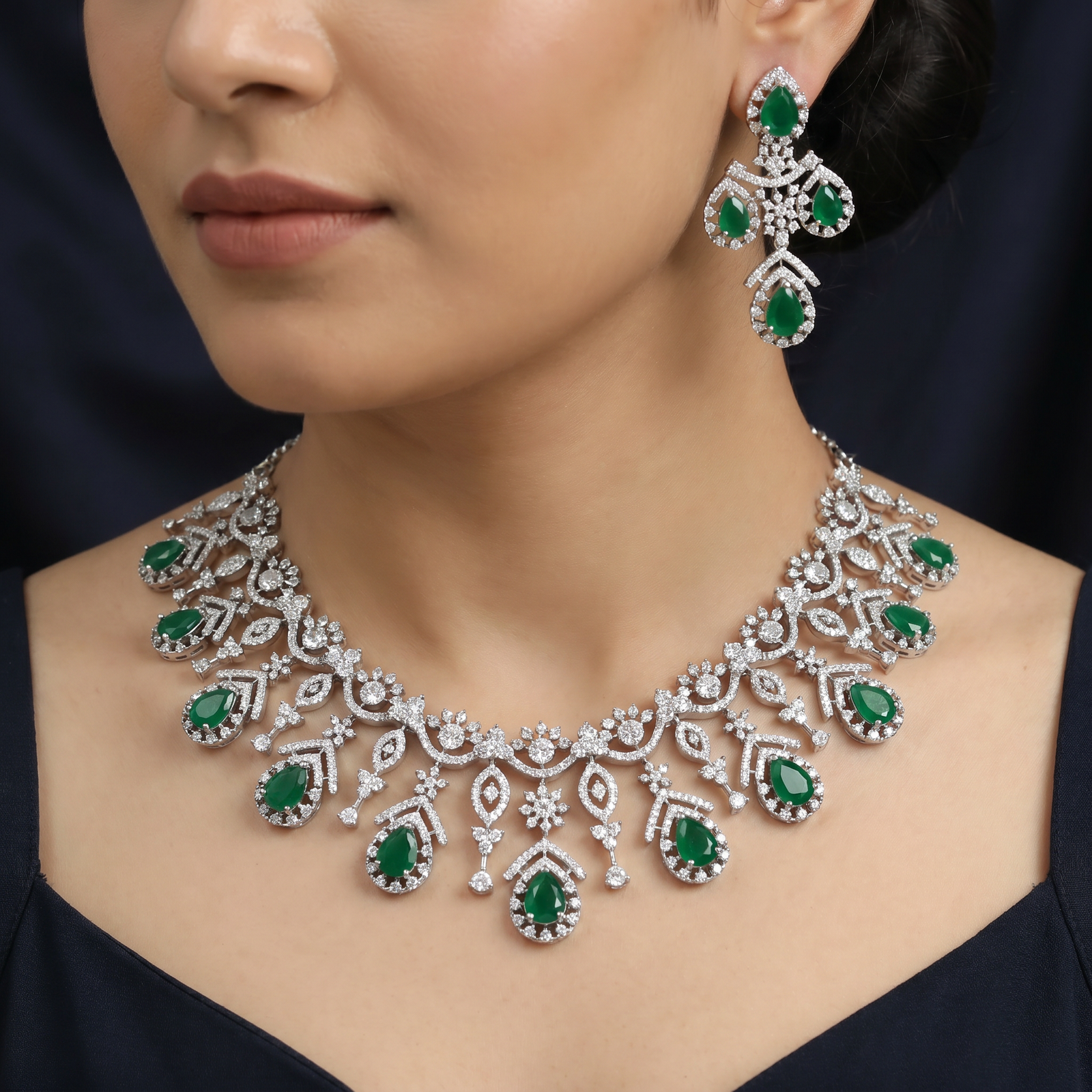 Rosette frame necklace with articulated fringe detailing