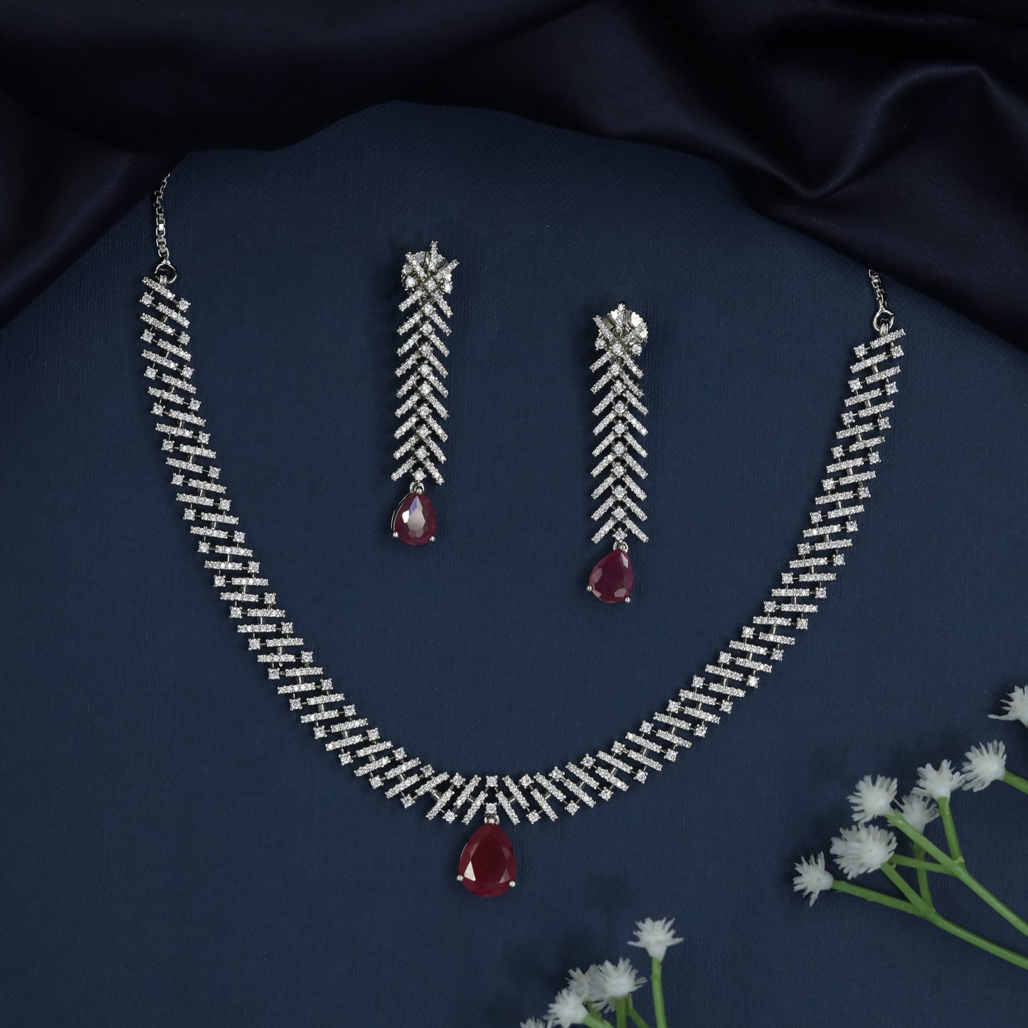Rhodium Necklace with Chevron Trail Silhouette and Statement Drop