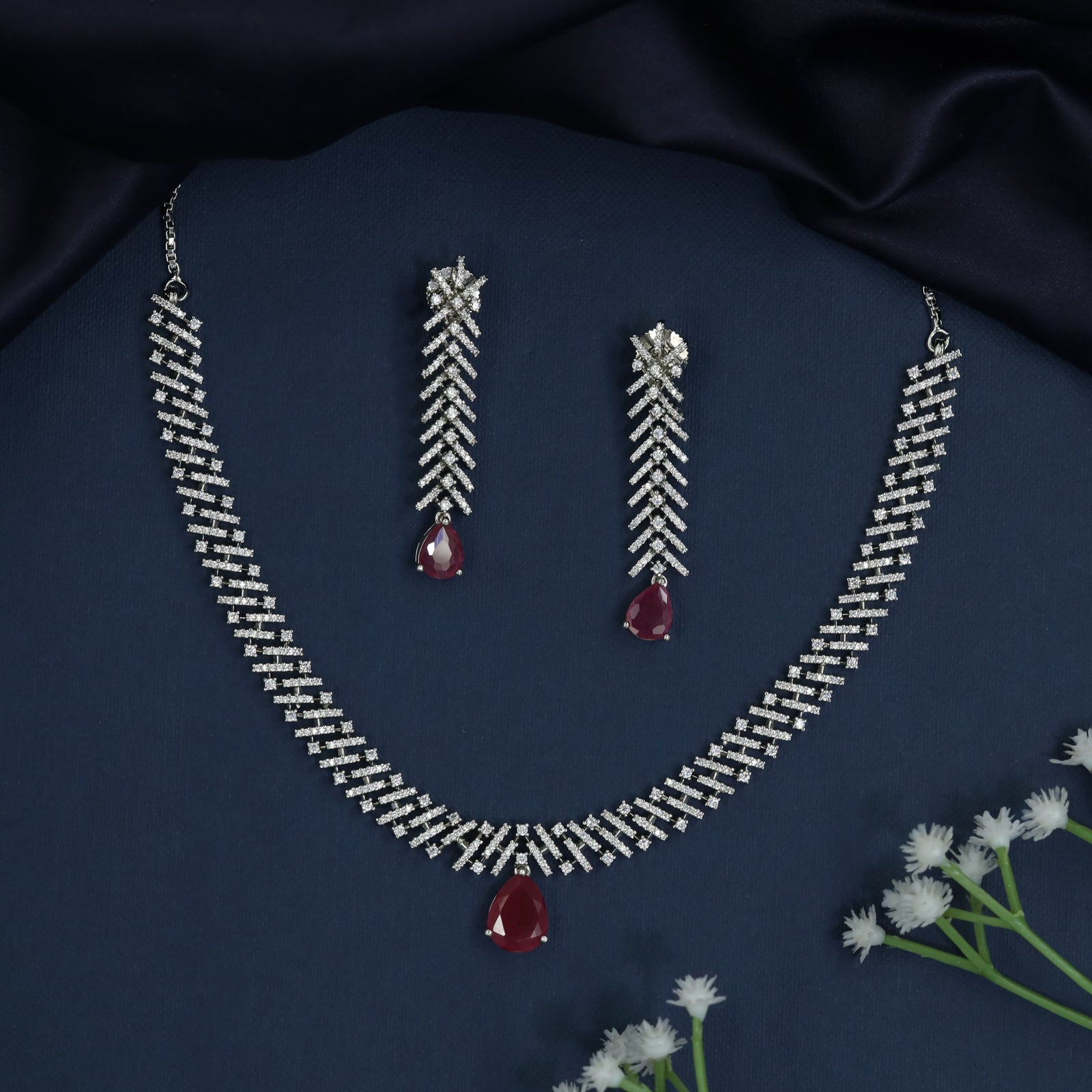 Rhodium Necklace with Chevron Trail Silhouette and Statement Drop