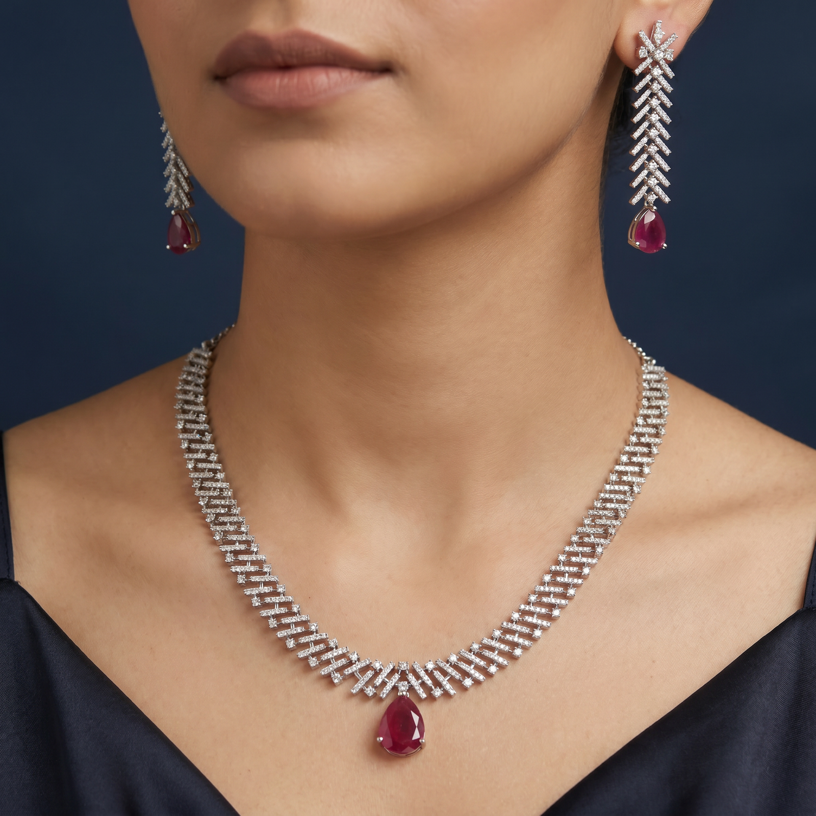 Rhodium Necklace with Chevron Trail Silhouette and Statement Drop