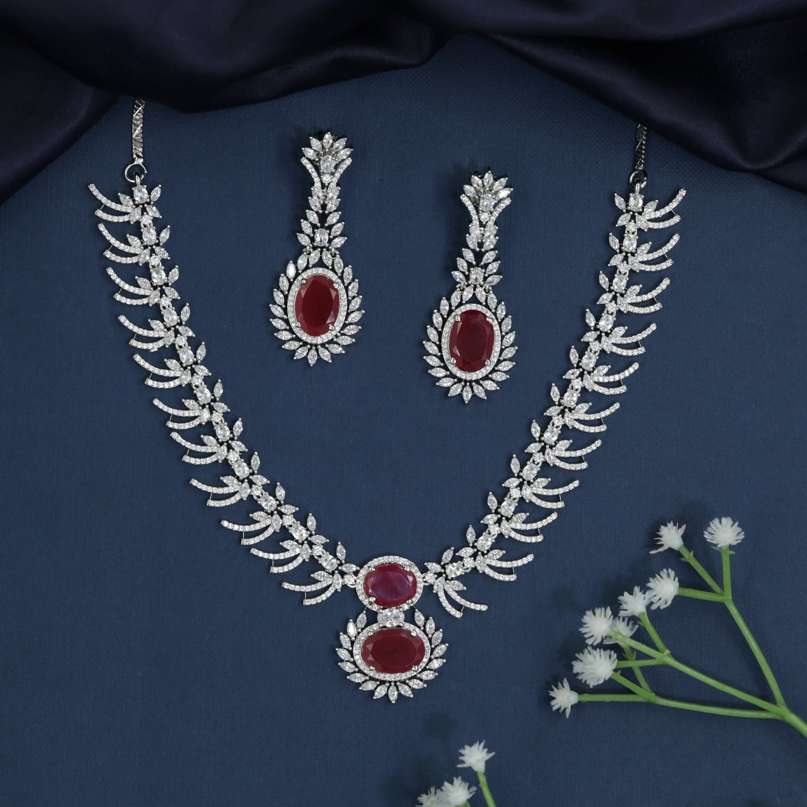 Wing inspired necklace with marquise leaf arrangement
