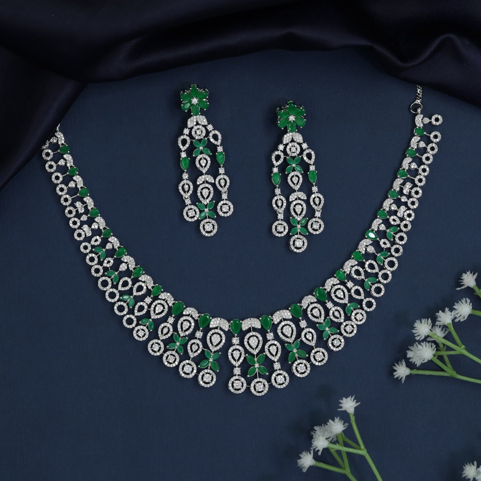 Designer necklace with floral links and drop accents