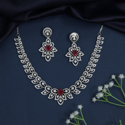Leaf pattern necklace with floral centerpiece design