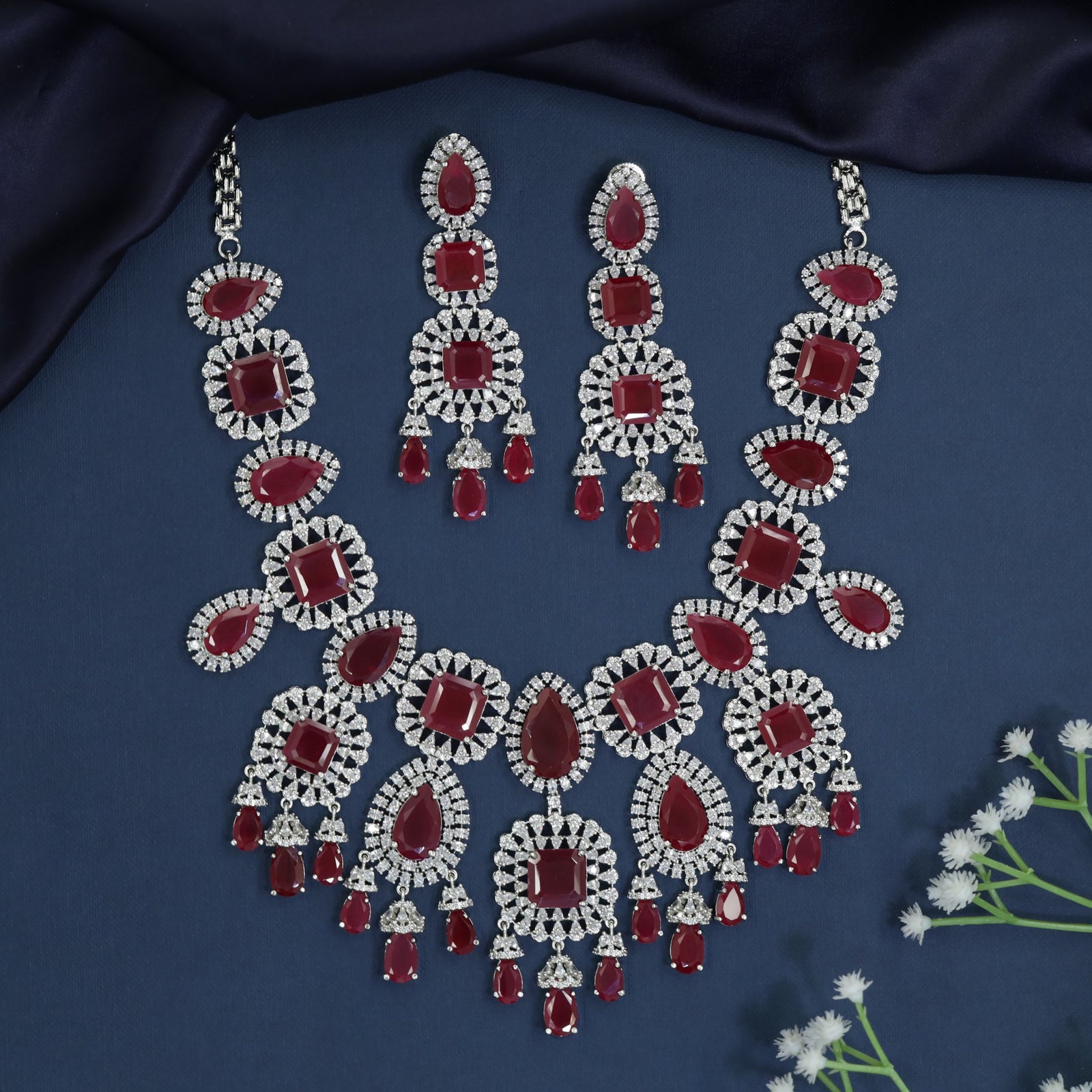 Medallion link necklace with chandelier fringe styling