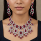 Medallion link necklace with chandelier fringe styling