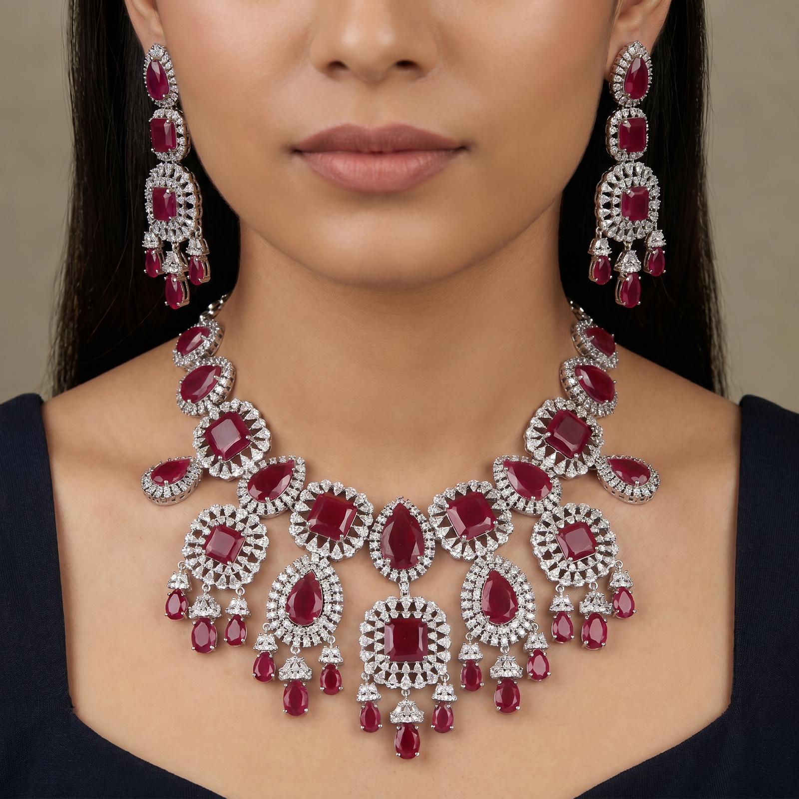 Medallion link necklace with chandelier fringe styling