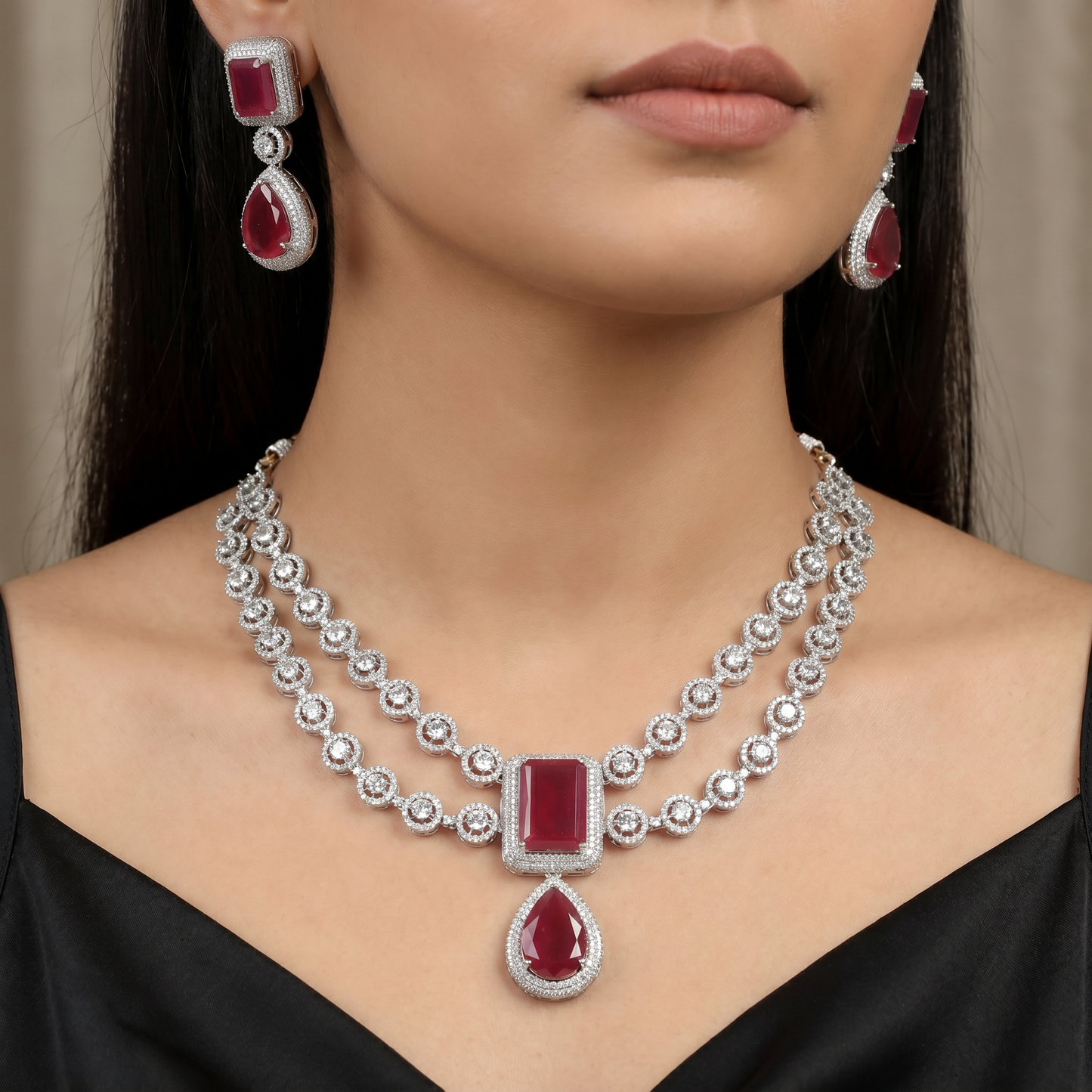 Circular frame necklace with pendant drop centerpiece