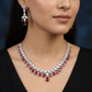 Pear drop fringe necklace with scalloped station design