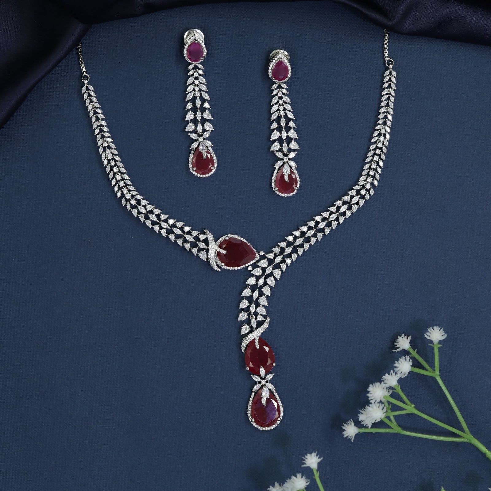 Statement necklace with woven link collar and drop centerpiece