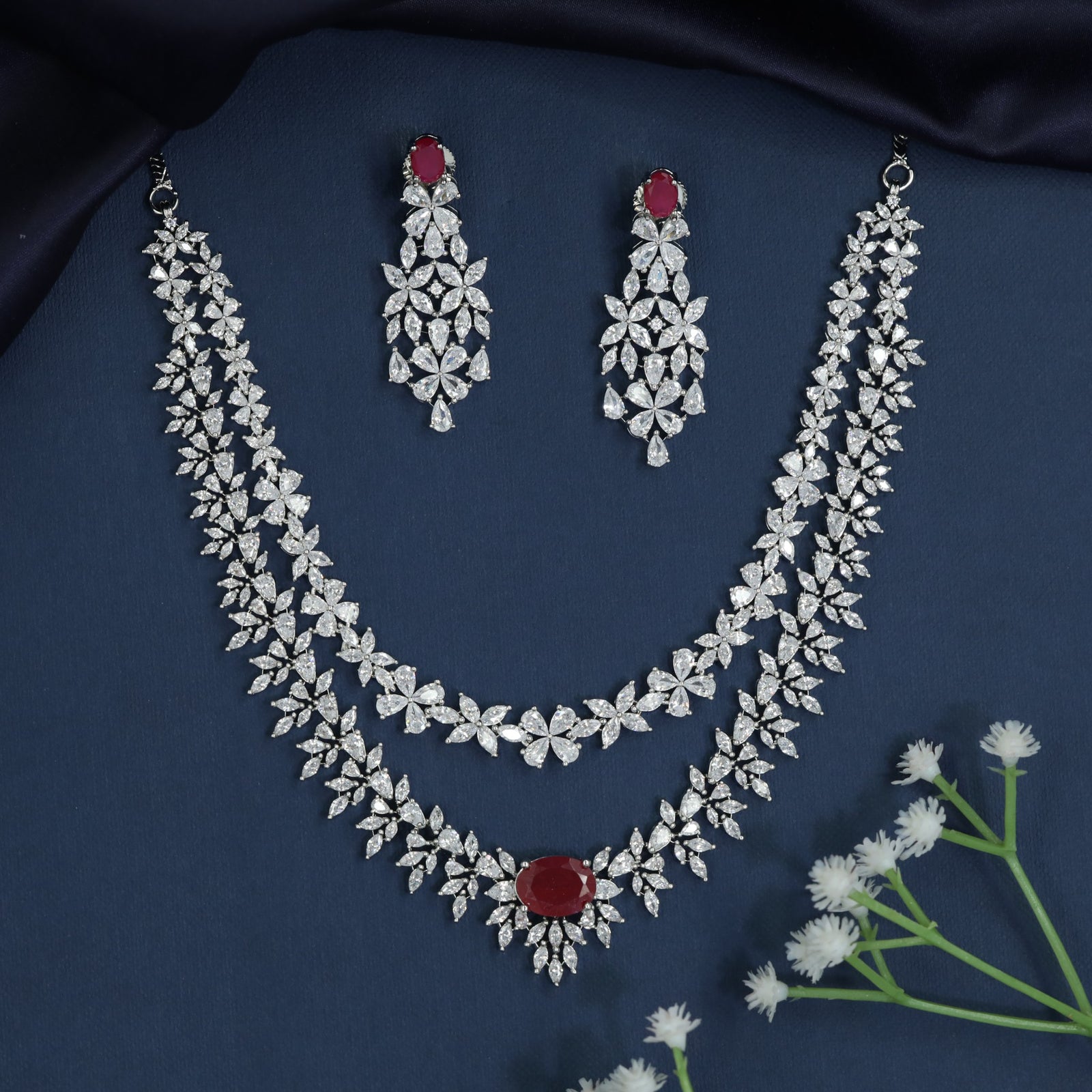 Necklace with Radiant Blossom Formation and Layered Styling