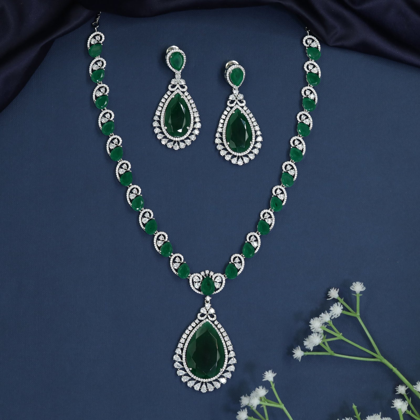 Necklace with Pavilion Pendant Focus and Infinity Linkwork Detailing