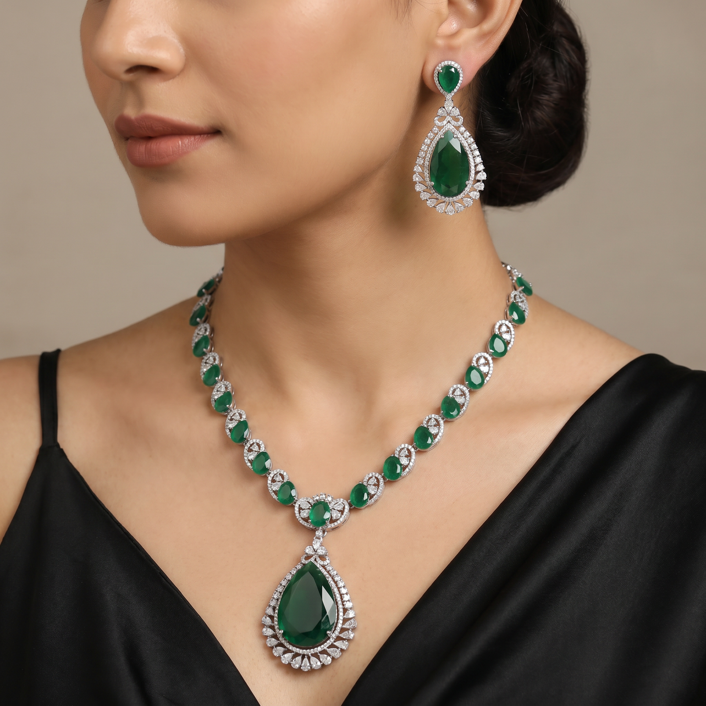 Necklace with Pavilion Pendant Focus and Infinity Linkwork Detailing