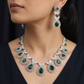 Necklace with Rosette Inspired Links and Halo Teardrop Arrangement
