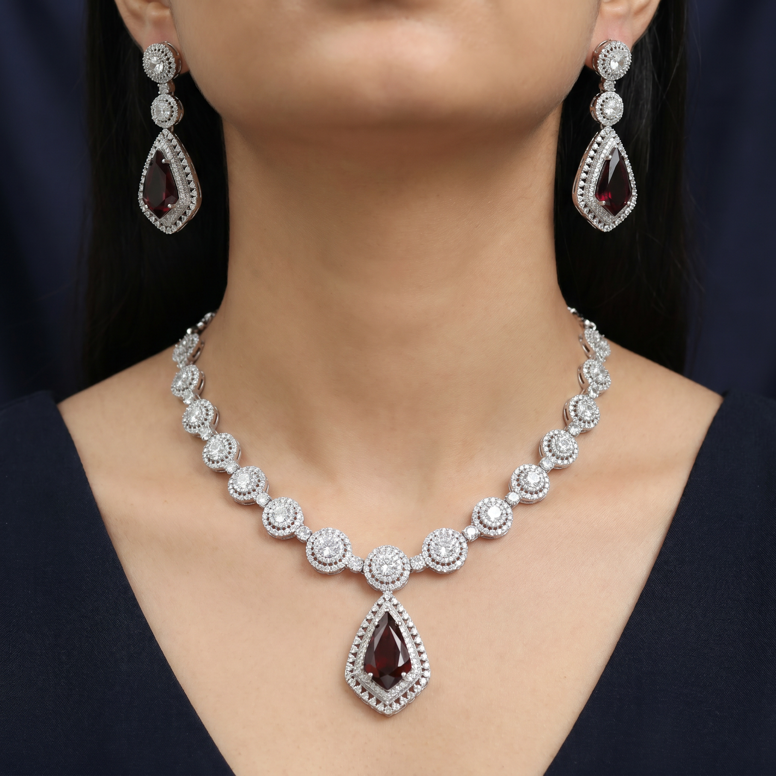 Necklace with Circular Halo Arrangement and Pendant Focus