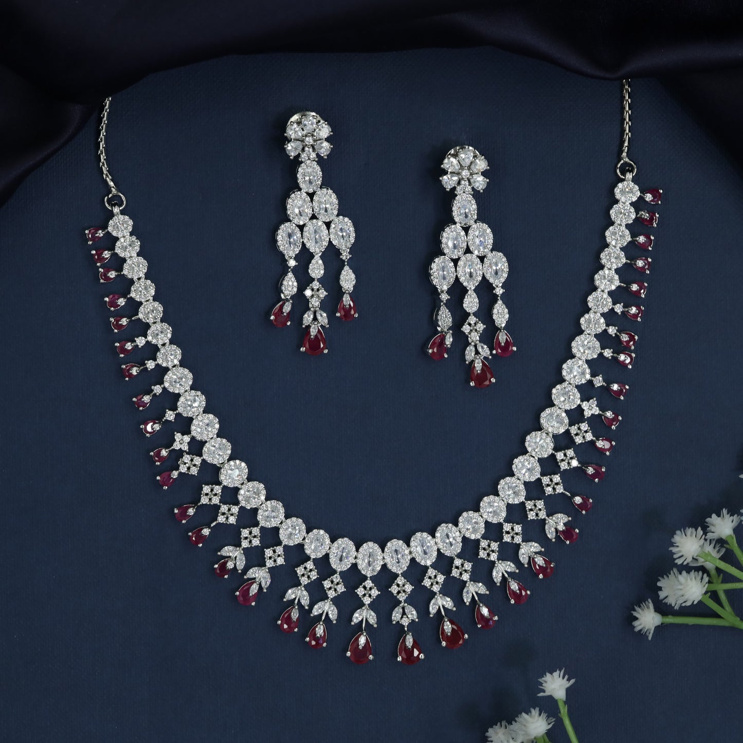 Necklace with Graduated Halo Frames and Decorative Fringe Accents