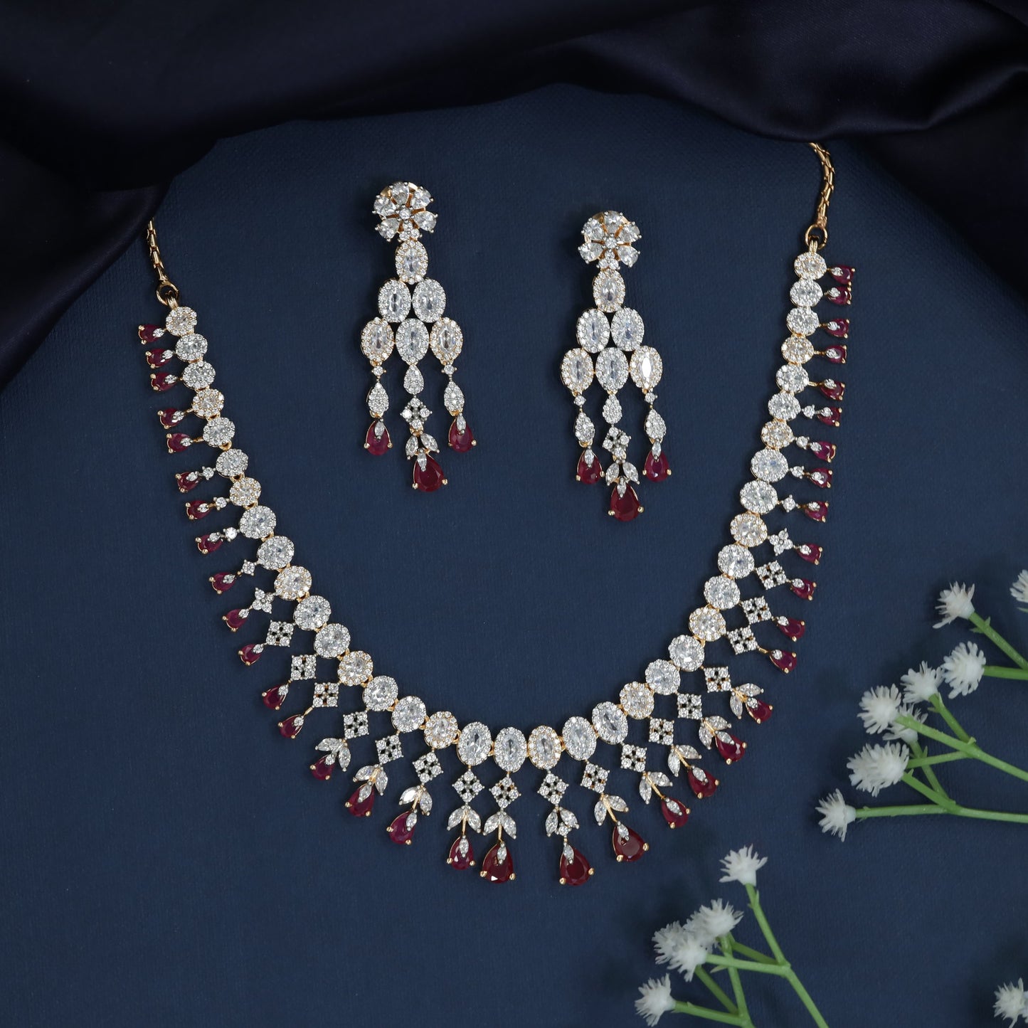 Necklace with Graduated Halo Frames and Decorative Fringe Accents