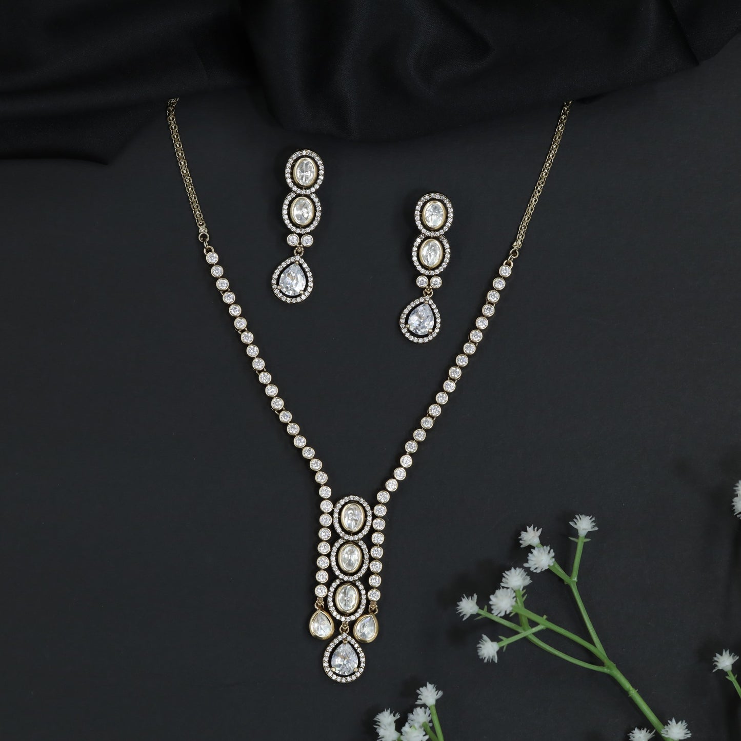 Kundan Drop Necklace Set with Pear Cut Statement Pendant Design